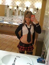 TopRq.com search results: young teen girl taking pictures in a mirror with iphone