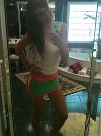 TopRq.com search results: young teen girl taking pictures in a mirror with iphone