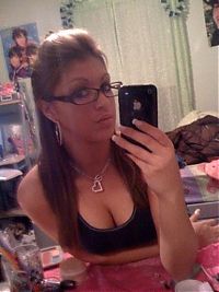 TopRq.com search results: young teen girl taking pictures in a mirror with iphone