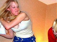 People & Humanity: girls fighting with pillows