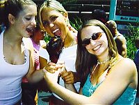 People & Humanity: girls eating a turkey leg