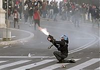 People & Humanity: Protesters clashes against Silvio Berlusconi, Rome, Italy