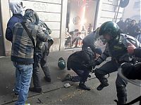 People & Humanity: Protesters clashes against Silvio Berlusconi, Rome, Italy