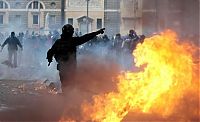 People & Humanity: Protesters clashes against Silvio Berlusconi, Rome, Italy