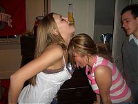 People & Humanity: girls drinking from breasts cleavage