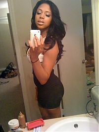 TopRq.com search results: young teen girl taking pictures in a mirror with iphone