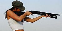 People & Humanity: girl with a gun