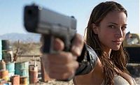 People & Humanity: girl with a gun