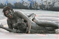 People & Humanity: dirty girls in mud
