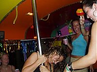 People & Humanity: young teen college girls performing a pole dancing solo