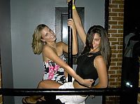 People & Humanity: young teen college girls performing a pole dancing solo