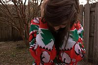 TopRq.com search results: girl wearing a christmas sweater