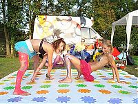 People & Humanity: party girls playing twister game