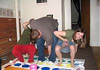 People & Humanity: party girls playing twister game