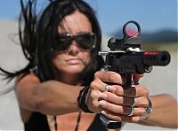 People & Humanity: girl with a gun