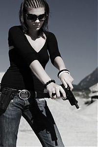 People & Humanity: girl with a gun