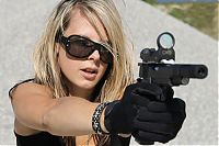 People & Humanity: girl with a gun