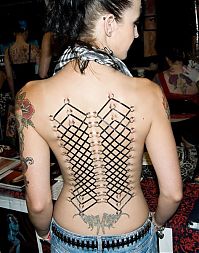 People & Humanity: girl with a corset piercing and extreme body modifications