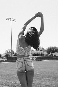 People & Humanity: young girl in jean shorts