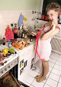 People & Humanity: young girl in the kitchen