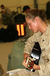 People & Humanity: girl in a military