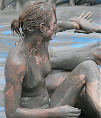 People & Humanity: dirty girls in mud