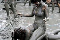 People & Humanity: dirty girls in mud