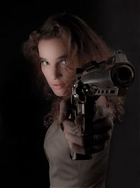 People & Humanity: girl with a gun