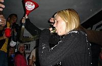 People & Humanity: young girl with a beer bong