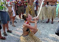 People & Humanity: young girl with a beer bong