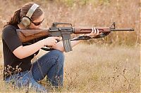 People & Humanity: girl with a gun