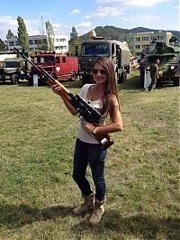 People & Humanity: girl with a gun