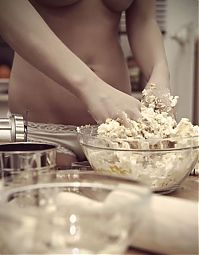 People & Humanity: young girl making cookies in the kitchen