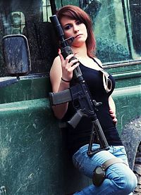 People & Humanity: girl with a gun