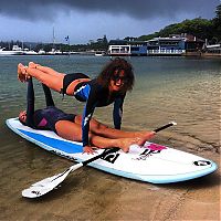 People & Humanity: paddle board yoga surfing girl