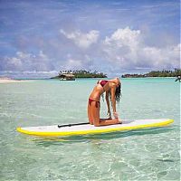 People & Humanity: paddle board yoga surfing girl