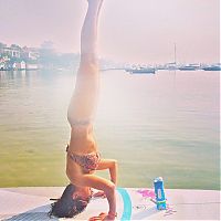 People & Humanity: paddle board yoga surfing girl