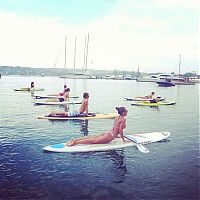 People & Humanity: paddle board yoga surfing girl