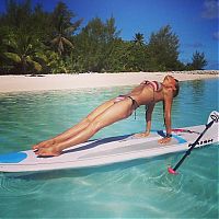 People & Humanity: paddle board yoga surfing girl