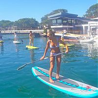People & Humanity: paddle board yoga surfing girl