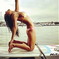 People & Humanity: paddle board yoga surfing girl