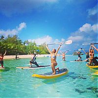 People & Humanity: paddle board yoga surfing girl