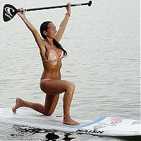 People & Humanity: paddle board yoga surfing girl