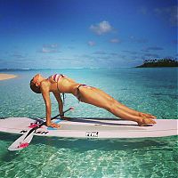 People & Humanity: paddle board yoga surfing girl