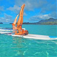 People & Humanity: paddle board yoga surfing girl