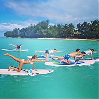 People & Humanity: paddle board yoga surfing girl