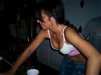 People & Humanity: young girls playing beer pong