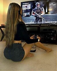 People & Humanity: girl playing video games