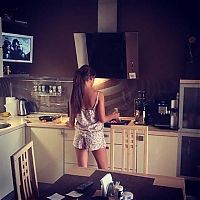 People & Humanity: young girl in the kitchen