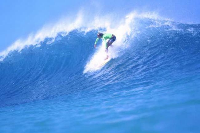 young surfing girl